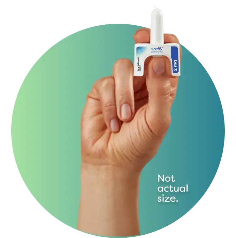 Upright hand holding neffy device in proper position for usage